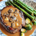 Filet Mignon with Brandy Mushroom Cream Sauce, Parmesan Hasselback Golds & Slightly Burnt Brussels Sprouts 🥩🍄✨