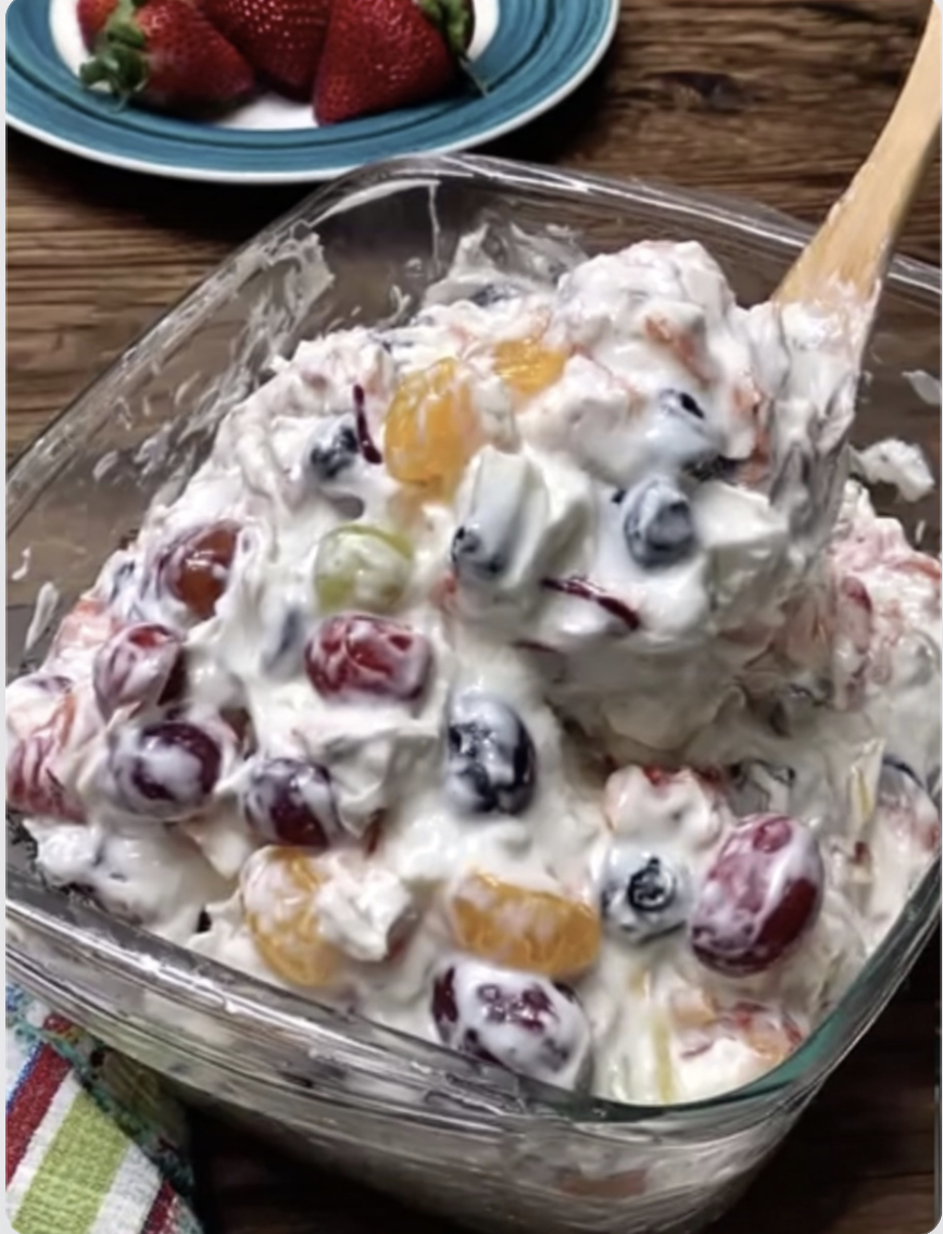 creamy fruit salad in a glass