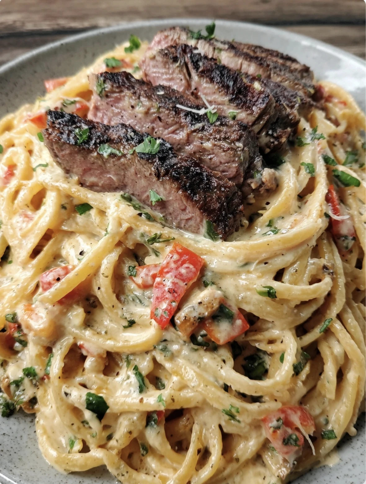 STEAK ALFREDO SPAGHETTI WITH CREAMY PARMESAN AND ROASTED RED PEPPERS